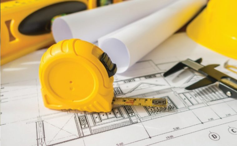 On-site consultation and measuring with tape measure and plans — Total Office Furniture